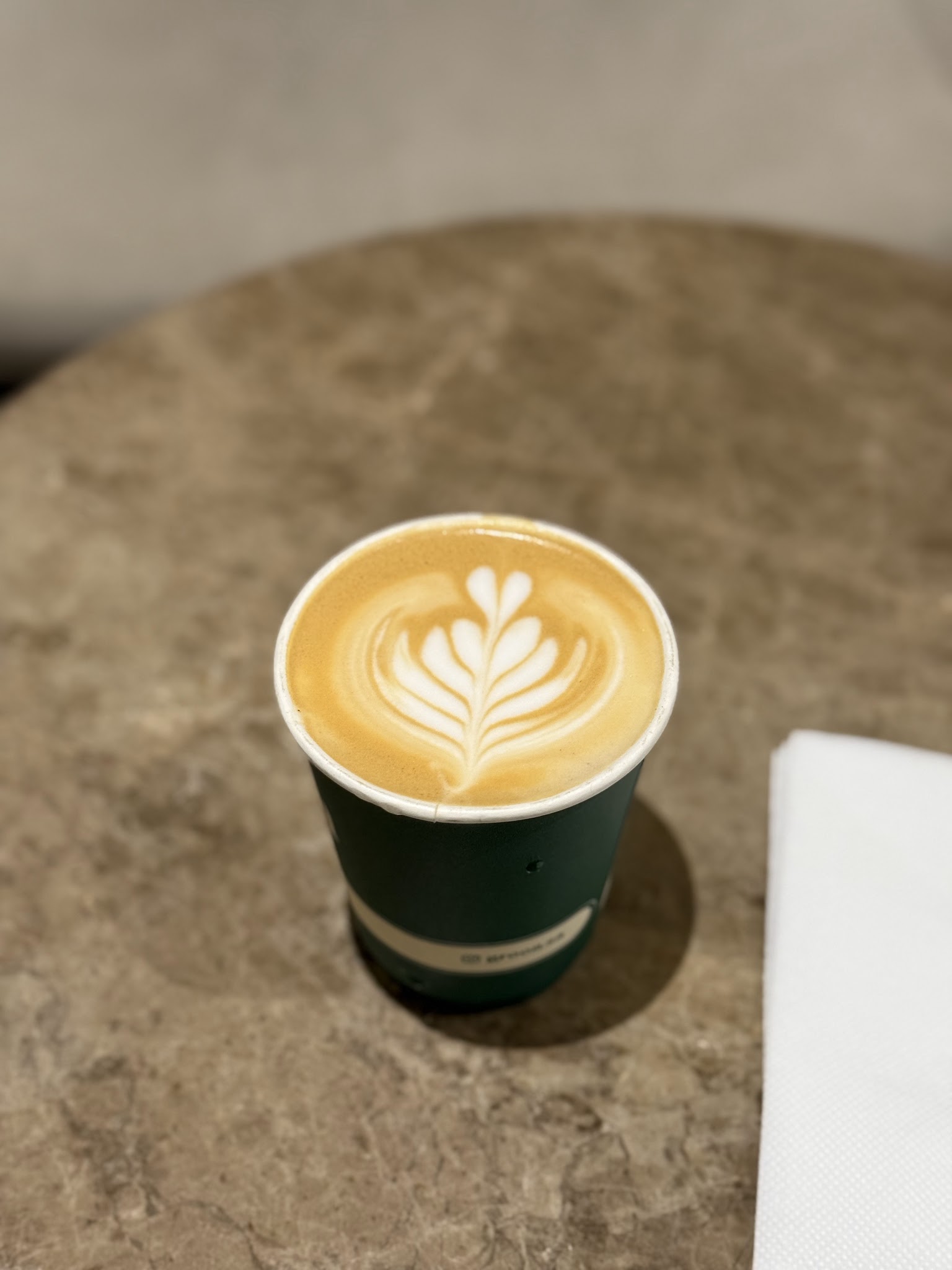 Latte in to-go cup